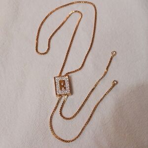 Elegant Gold Necklace with Crystal Pendant